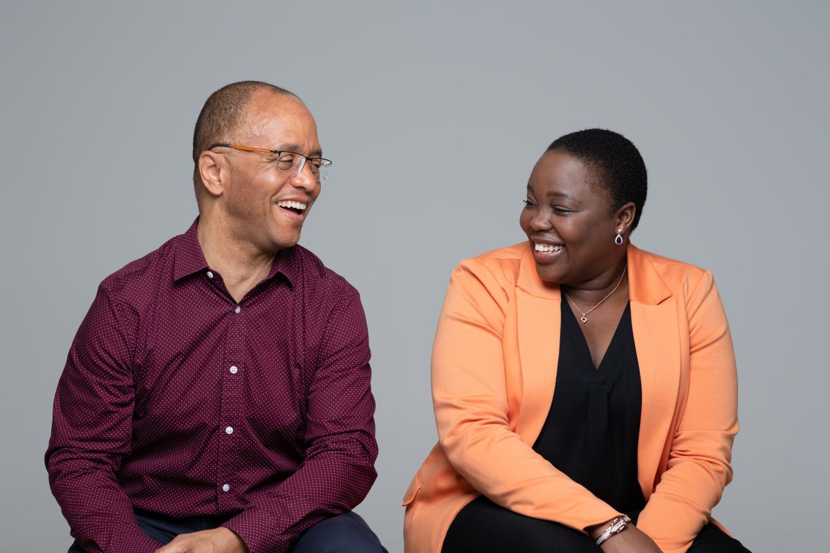 Client and coach laughing together.